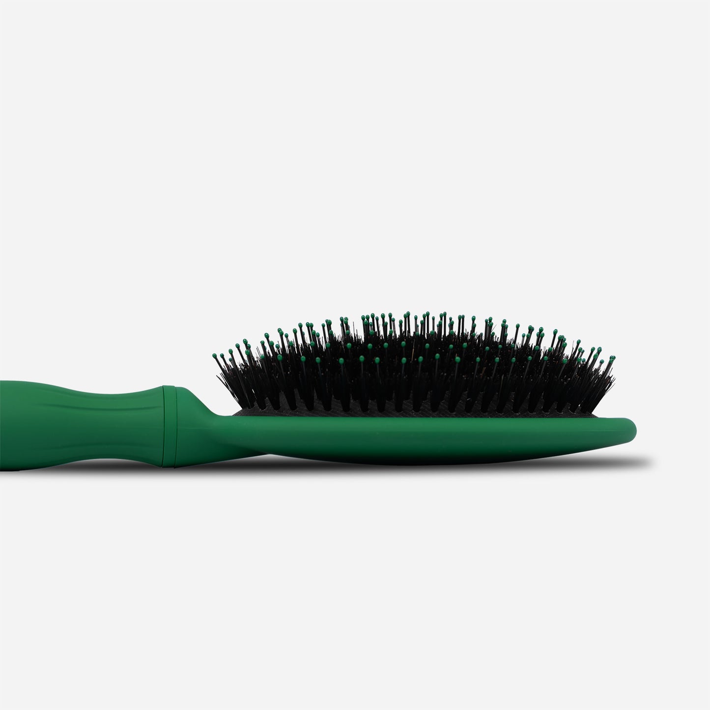 Close-up of the ultra-soft dual-bristle technology on the Knot Your Typical sensory brush. Designed to glide through tangles without scraping the scalp or pulling hair.